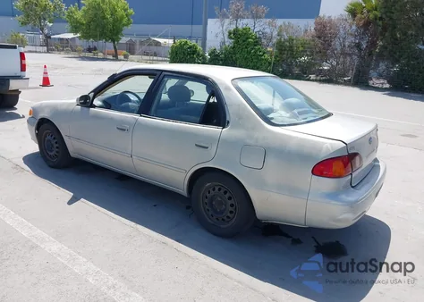 2001 Toyota Corolla Le из США, поврежденный, VIN 2T1BR12E71C491249